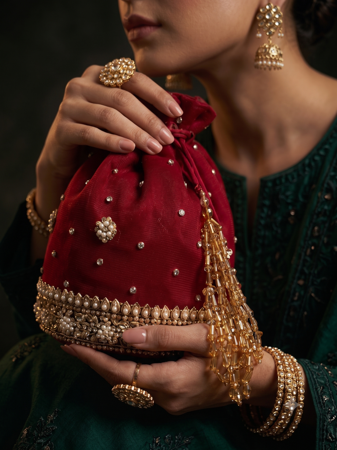 Ruby Pearl Tassel Potli